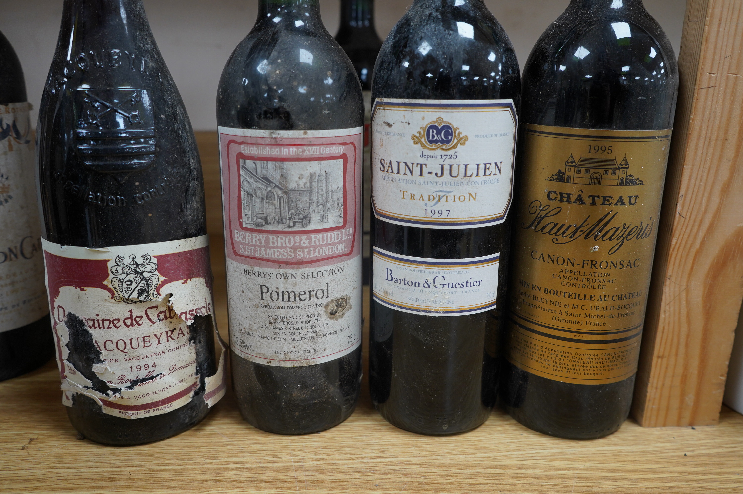 Twelve bottles of mixed red and white wine; a bottle of Chateau d’Ardennes 1989, a bottle of Chateau Chouteau, 1997, Lussac - Saint - Emilion, and two bottles of Chateau Langoa Barton, Saint Julien 1993 (12). Condition -